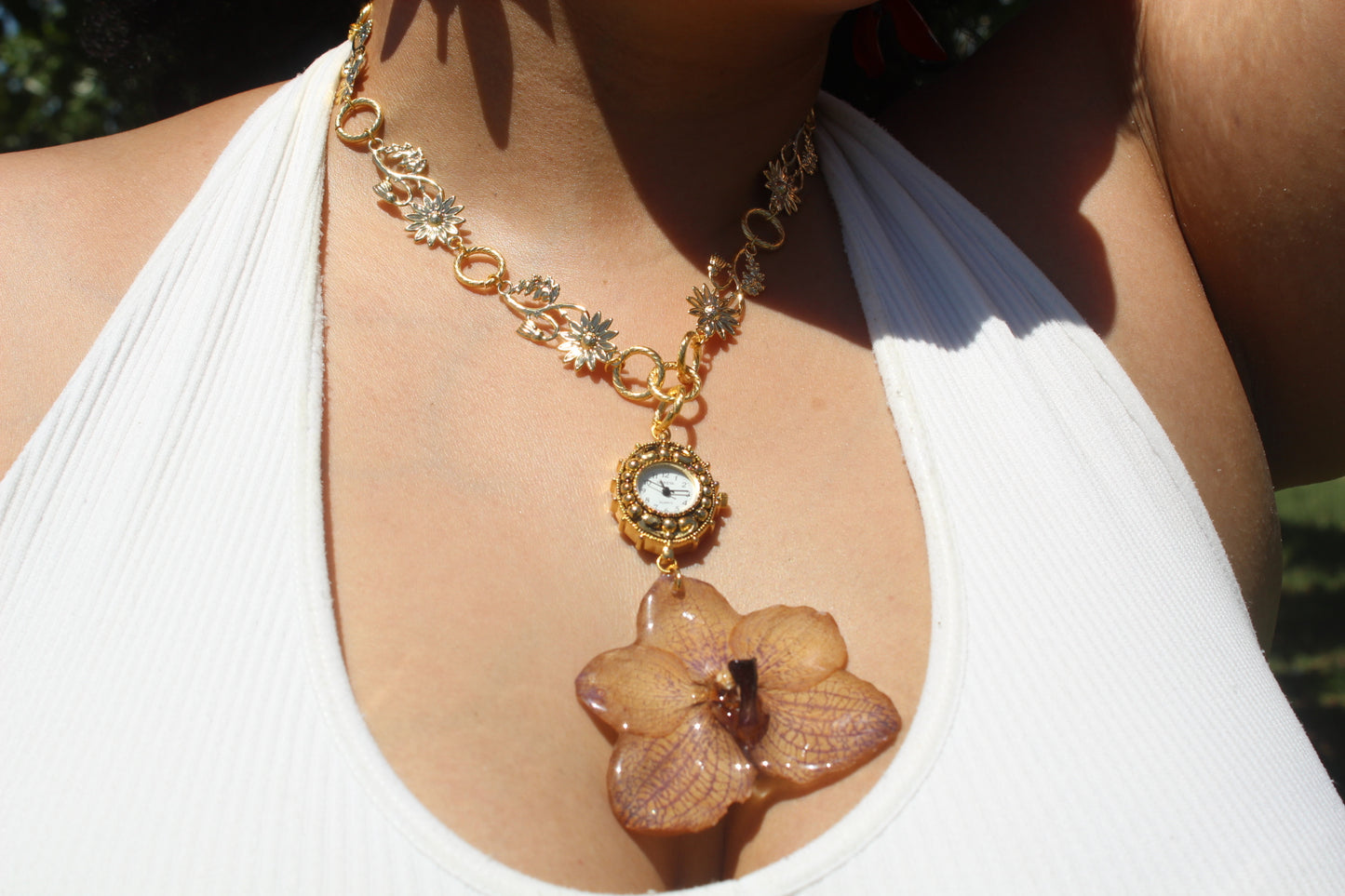 Orchid necklace clock