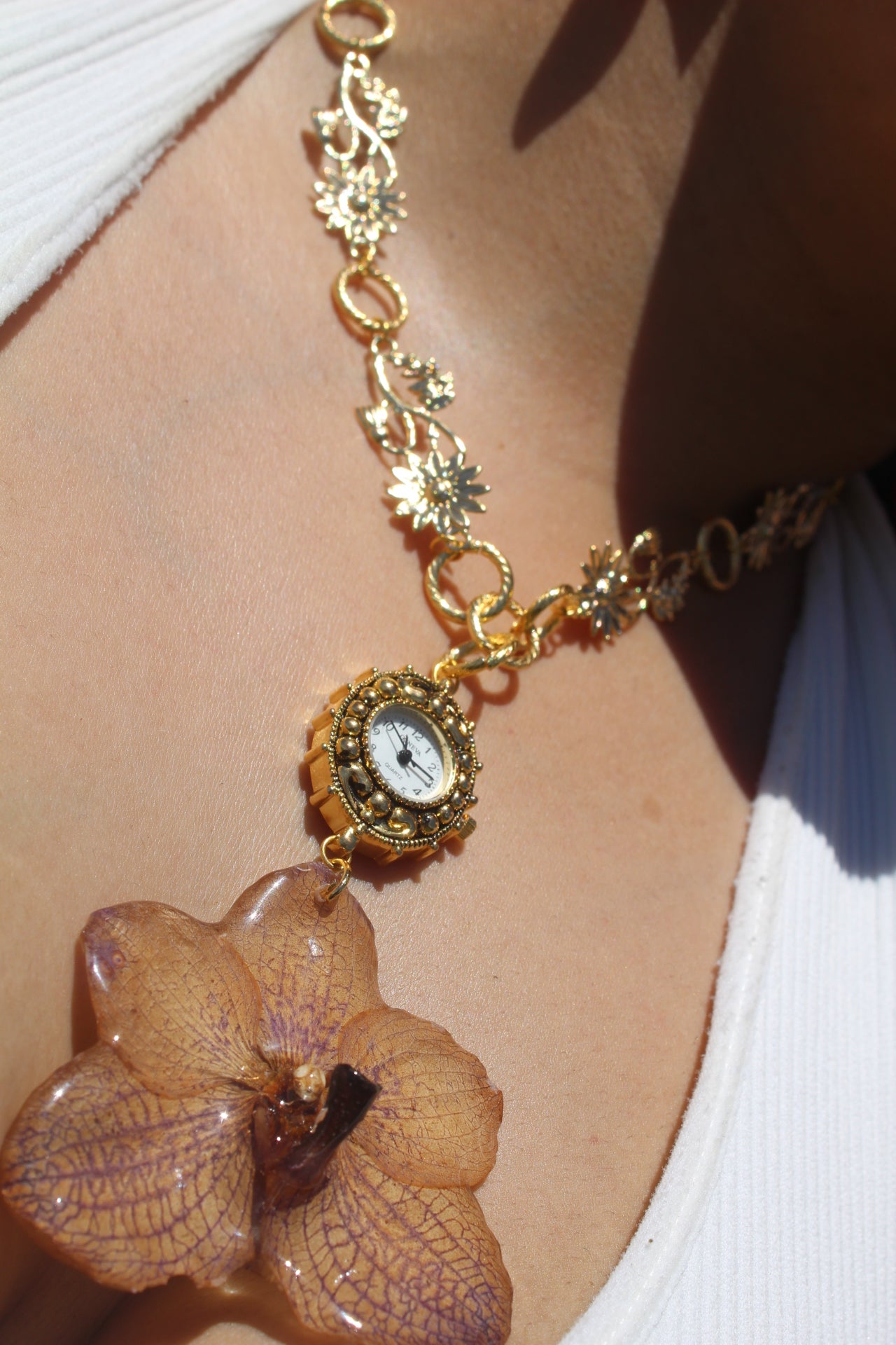 Orchid necklace clock
