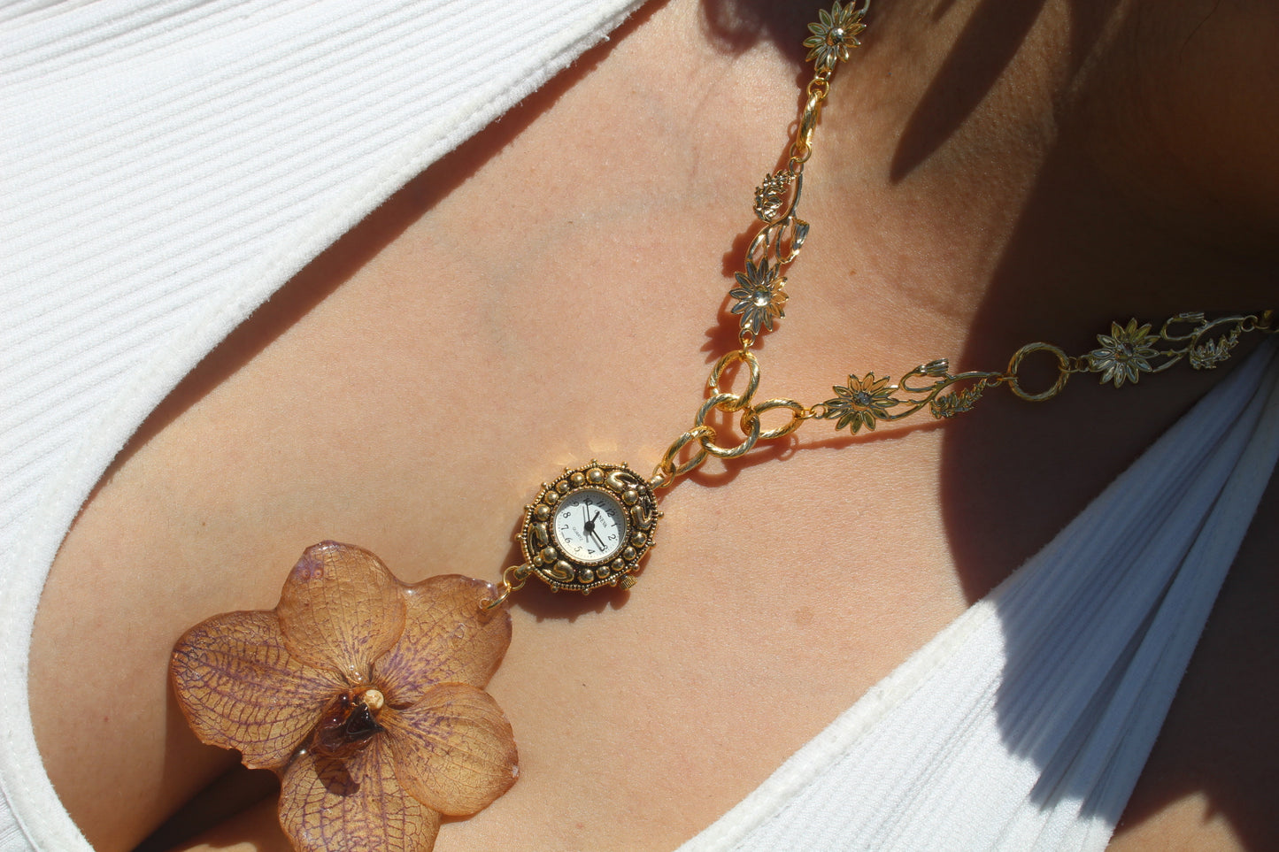 Orchid necklace clock