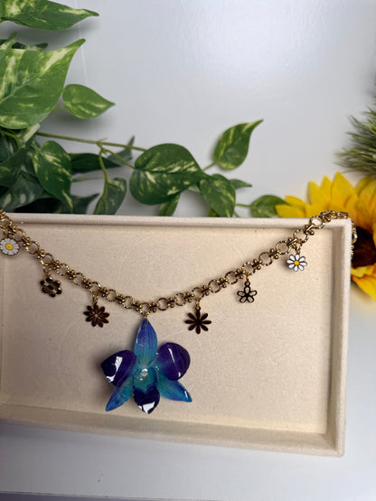 Blue orchid charm necklace