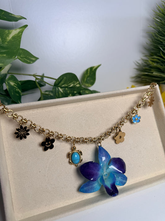 Blue orchid charm necklace
