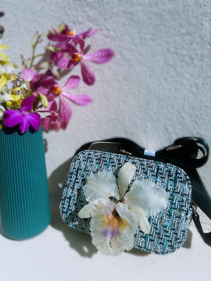 Cartera de orquídea Cattleya natural